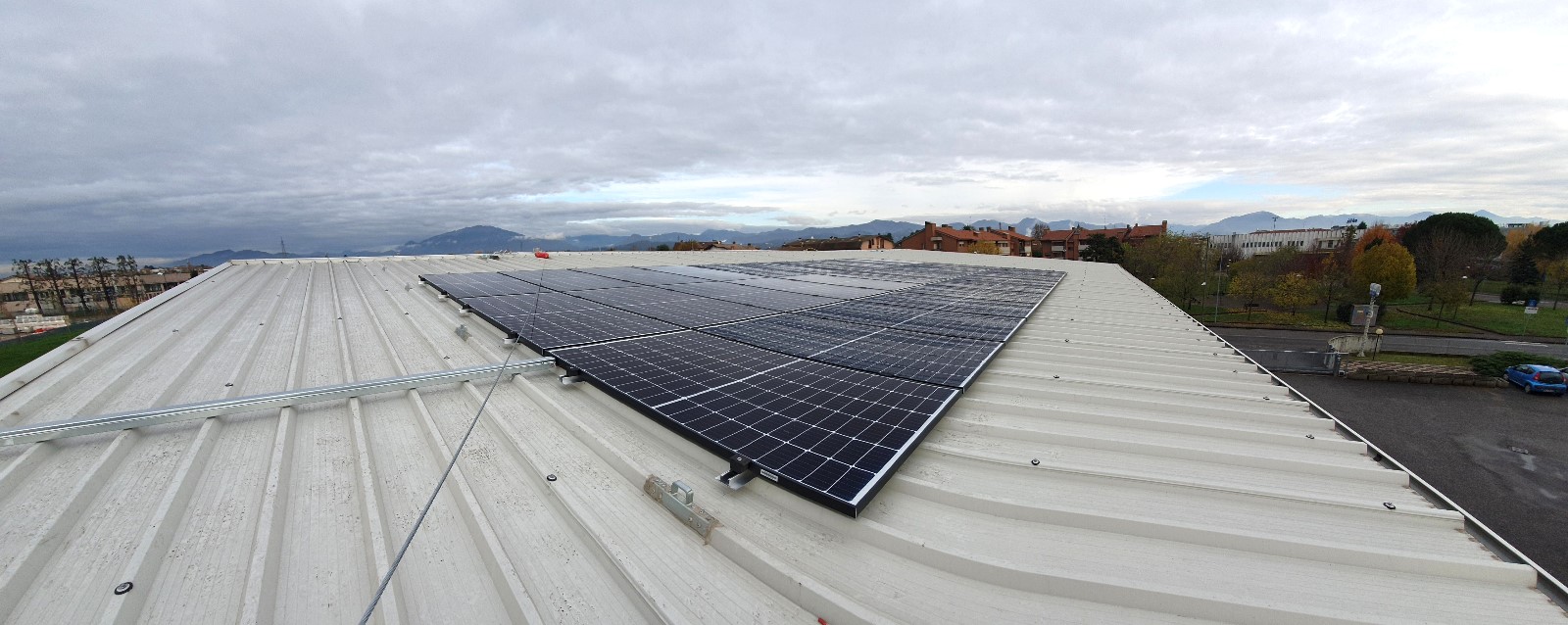 REMONDINI IMPIANTI - posa e controllo struttura fotovoltaica su capannone industriale